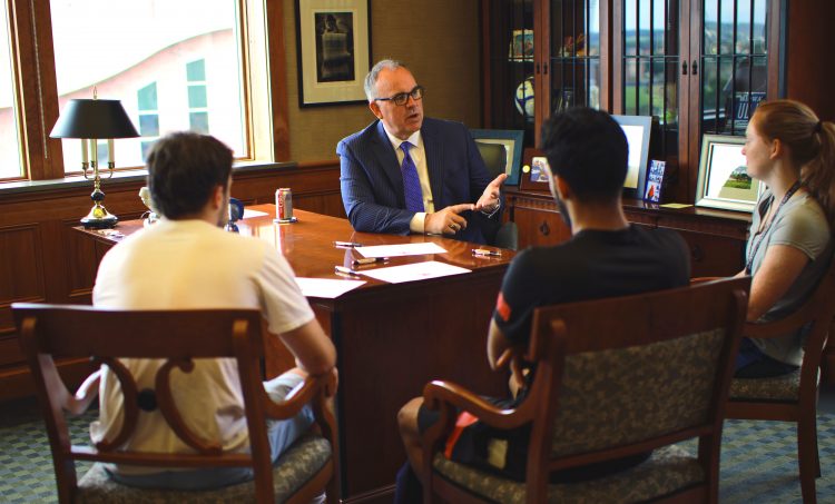 Jeffrey Bullock with University of Dubuque Students