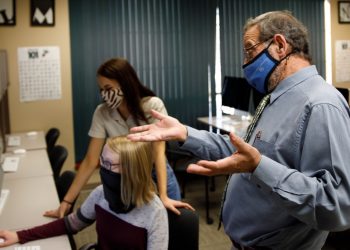 University of Dubuque Teacher with Students
